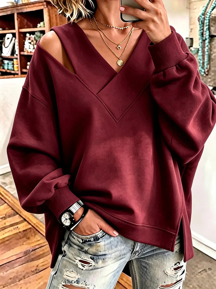 Kirstan - Sudadera Oversize Con Cuello en V y Aberturas Elegantes